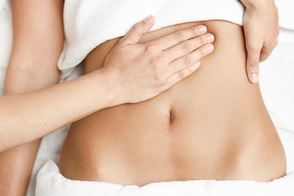 Sanfte Bauch-Massage